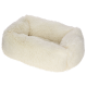 Flauschiges, cremefarbenes Haustierbett in runder Form, entworfen für Komfort und Wärme.
