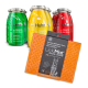 Vier bunte Gläser mit SmoothieDog-Haustiersnacks, beschriftet mit "Huhn", "Lamm" und "Rind", neben einem orangefarbenen LickiMat Buddy Large.