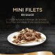 Mini filets en sauce sur une assiette blanche, présentant des morceaux de viande tendre recouverts d'une sauce crémeuse, garnis de ciboulette.