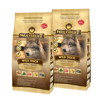 Sacs de nourriture pour chiens premium Wolfsblut présentant "Wild Duck" pour les petites races, avec une image de loup et des points nutritionnels sur l'emballage.