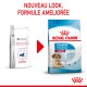 Deux sacs de nourriture pour chiens : à gauche, Royal Canin Pediatric Starter ; à droite, nouvel emballage pour Royal Canin Starter pour chiens moyens, avec mère et chiots.