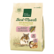 Packung von Real Nature Best Muesli für Zwerghamster, mit einer Cartoon-Zwerghamster-Abbildung, Mais und Text auf Deutsch und Französisch über die Zutaten.