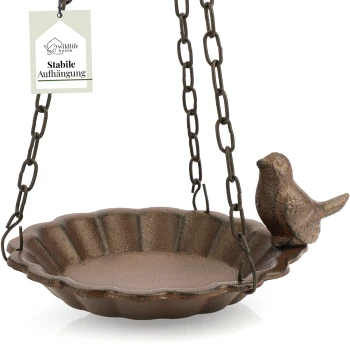 Hängender Vogelfutterspender mit gewelltem Rand und einer dekorativen Vogelfigur, beschriftet "Wildlife Home" mit dem Text "Stabile Aufhängung."