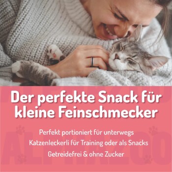 Hundetraining-Snack in einem pinken und schwarzen Behälter mit der Aufschrift "Ente ohne süß & sauer", mit hohem Fleischanteil und getreidefreier Formel.