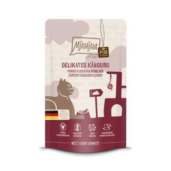 Mjamjam Delikates Känguru huisdiervoeding zakje met een kangoeroe-afbeelding, met tekst die de pure vleeskwaliteit en taurine-inhoud benadrukt.