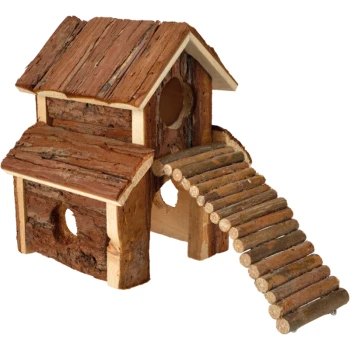 Holzhaustierhaus mit einem geneigten Dach, zwei runden Öffnungen und einer Holzbrücke, die zum Eingang führt.