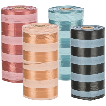 Quatre rouleaux de sacs à déchets pour animaux de compagnie colorés à rayures en rose, cuivre, bleu sarcelle et noir, présentés debout sur un fond blanc.