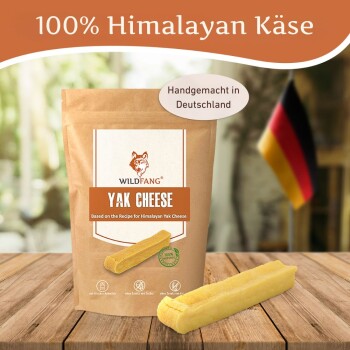 Braune Verpackung von Wildfang Yak Käse Hundesnack auf Holztisch mit deutscher Flagge und Text „100 % Himalaya Käse“ und „Handgemacht in Deutschland“.