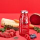 Eine SmoothieDog Rind-Hundesnackflasche auf rotem Hintergrund, umgeben von frischem Gemüse und Beeren, mit "bestes Fleisch" und "100% natürlich."