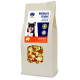 Eine Tüte Blue Tree Wellness Flakes für Haustiere, beschriftet mit "Sommer-Früchte" mit Banane, Apfel und Erdbeere. Glutenfrei.