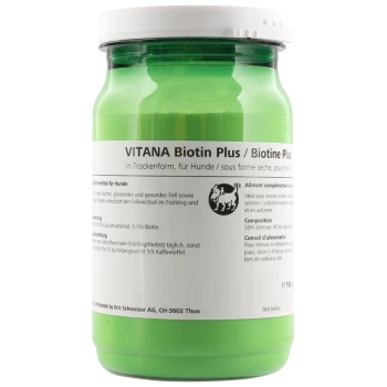 Grünes Glas VITANA Biotin Plus für Hunde, mit Nährwertangaben und Anwendungshinweisen auf dem Etikett.