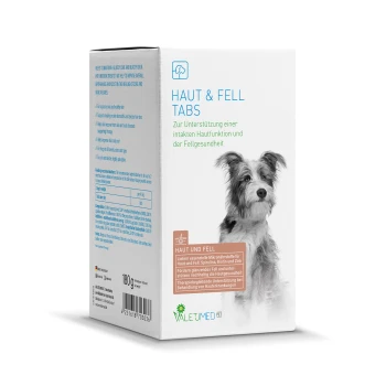 Box mit "Haut & Fell Tabs" für Hunde, mit einem Hund auf der Vorderseite, mit Text auf Deutsch über die Unterstützung der Haut- und Fellgesundheit.