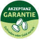 Grünes und hellgrünes rundes Abzeichen mit dem Text „Akzeptanz Garantie“ und „Zufrieden oder Geld zurück“ um drei weiße Tierfutterpellets.