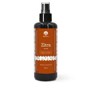 Schwarze Sprühflasche mit orangefarbenem Etikett 'Zitra' (Waldkraft), sichtbarer Text 'Gegen Zecken, Effektives Biozid, 100 ml'.