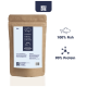 Braune Papiertüte mit Hundefutter, beschriftet mit "KAUDAS," mit einem blauen Feld, das den Text "100% Fisch," "90% Protein," und "Mit Omega-3" angibt.