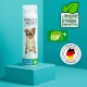 Flasche mit GREEN HERO Floh- und Zecken-Shampoo für Hunde, mit einem lächelnden Hund auf dem Etikett, mit 'Forte+' und 'Made in Germany' Logos.
