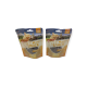 Deux paquets de DeliBest Cat Snack au goût de poulet, avec des images de chats sur le devant, étiquetés 'Keine Zuckerzusätze' (sans sucres ajoutés).