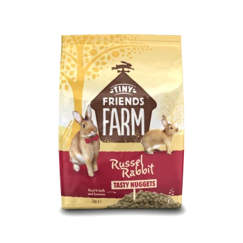 Tiny Friends Farm Russel Rabbit Tasty Nuggets pet food bag with two rabbits and 2kg weight.