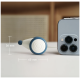 Eine Nahaufnahme eines weißen und blauen Haustierspielzeugs neben einem Smartphone, mit Maßen, die die Abmessungen des Spielzeugs anzeigen: 36 mm Höhe und 60 mm Breite.