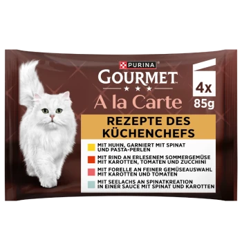Purina Gourmet A la Carte Katzenfutterbeutel mit Foto einer weißen, langhaarigen Katze sowie dem Text 'Rezepte des Küchenchefs' und '4 x 85 g'.