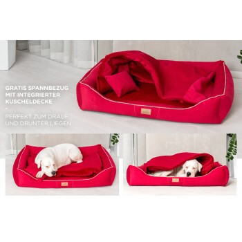 Rotes Hundebett mit Decke; ein weißer Hund entspannt sich. Text: "Kostenlose Abdeckung mit integrierter Decke - perfekt zum Liegen auf und unter."