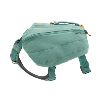 Ein türkisfarbener Hunderrucksack von Ruffwear, mit einem Reißverschlussfach, verstellbaren Riemen und einem stabilen Griff oben.