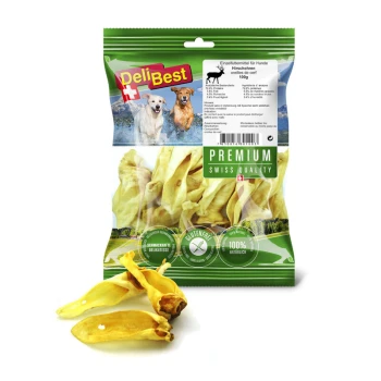 DeliBest Hundeleckerlis in einer grünen Tüte mit zwei Hunden am Wasser, mit Text, der "Premium Schweizer Qualität", glutenfrei und 100% natürlich hervorhebt.