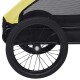 Nahaufnahme eines schwarzen Rades von einem Haustierwagen mit einem gelben Dach, das das Reifenprofil und das Radnaben-Design zeigt.