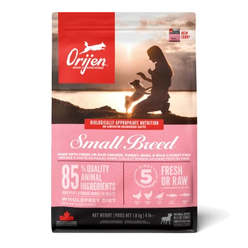 Sac de nourriture pour chiens de petite race Orijen avec un design rose, indiquant "85% Quality Animal Ingredients" et "Fresh or Raw."