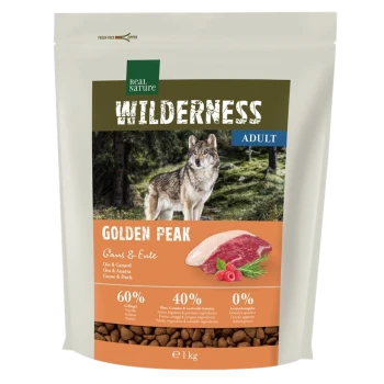 Hondenvoer zak gelabeld 'Wilderness Golden Peak' met een wolf afbeelding, met 60% vlees, 40% fruit en groenten, 0% granen.