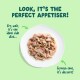 White plate of shredded wet pet food on green. Headline: LOOK, IT'S THE PERFECT APPETISER! Captions note it's the ideal side dish and dessert.