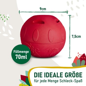 Rotes kugelförmiges Haustier-Leckerli-Spielzeug, Abmessungen 9 cm × 7,5 cm; grünes Etikett 'Füllmenge 70ml'; Banner 'DIE IDEALE GRÖßE'.