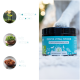 DENTA VITAL STICKS für Hunde in einem schwarzen Behälter, beschriftet mit "100% natürlich," mit Symbolen für Minze und Anis.