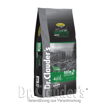 Beutel mit Dr. Clauder's mini sensitive adult Lamm- und Reis-Hundefutter, mit einer malerischen Berglandschaft im Hintergrund und Nährstoffdetails.