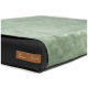 Grünes orthopädisches Haustierbett mit schwarzem Boden, mit einem braunen Etikett, das "Rexproduct® Ortho" liest.