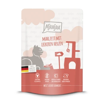 Pochette de nourriture pour animaux Mjamjam avec une silhouette de chat, le texte "MAHLZEIT MIT LECKEREN HERZEN," et un badge de qualité allemande, soulignant une forte teneur en viande.
