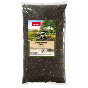 ® SONNENBLUMENKERNE SCHWARZ 1 kg Ein 1-kg-Beutel mit schwarzen Sonnenblumenkernen, beschriftet mit 'Sonnenblumenkerne - schwarz', mit einer Specht-Illustration und grünem Landschaftshintergrund.