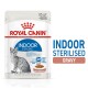 Royal Canin Indoor Sterilised cat food pouch, featuring a gray cat illustration, labeled "Indoor Sterilised" and "Gravy," with nutritional details.
