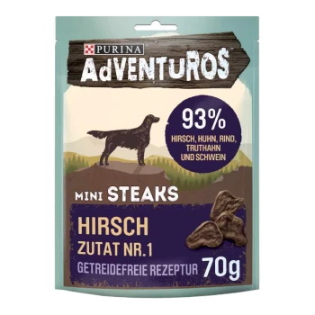 Verpackung von Purina AdVENTUROS Mini Steaks Hundeleckerlis, mit einer Silhouette eines Hundes, und Text, der 93% Fleischgehalt und ein getreidefreies Rezept hervorhebt.