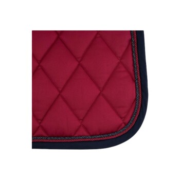 Rotes, gestepptes Hundebett mit marineblauem Rand, das ein Diamantmuster und kontrastierende Kantennaht aufweist.