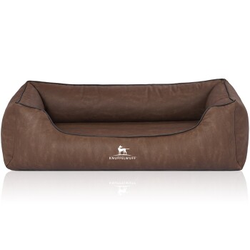 Braunes Hundebett mit schlankem Design und erhöhten Rändern, mit dem Logo 'KNUFFELWUFFF' prominent auf der Vorderseite angezeigt.