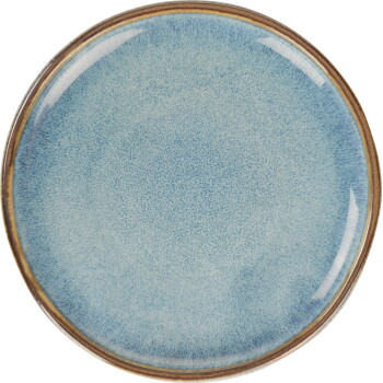 Leere runde, blau glasiere Keramik-Hundenapf mit braunem Rand, Draufsicht.