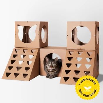 Katzenhaus The Superior Castle Eine getigerte Katze, die in einer Pappspielstruktur mit ausgeschnittenen Formen entspannt, mit einem gelben Garantieabzeichen, das "1 JAHR GARANTIE 100% GELD ZURÜCK" besagt.