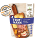 Hundefutterverpackung mit "TRUT-HAHN" mit Truthahn, Kartoffeln, Karotten und Äpfeln. Enthält ein Qualitätssiegel für 2024 und das Etikett "Erwachsene Hunde".