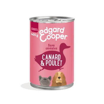 Boîte de nourriture pour chien Edgard Cooper, 400g, avec une étiquette rose illustrée d'un canard et d'un chien, étiquetée "Canard & Poulet" et "Sans céréales."