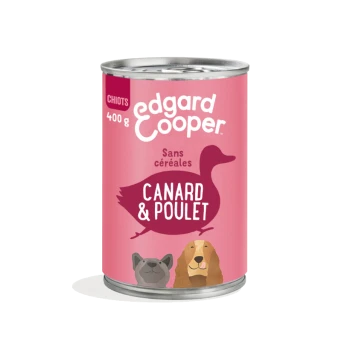Boîte de nourriture pour chien Edgard Cooper, 400g, avec une étiquette rose illustrée d'un canard et d'un chien, étiquetée "Canard & Poulet" et "Sans céréales."