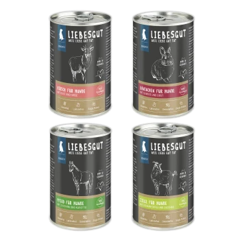 Vier LIEBESGUT-Hundefutterdosen (Hirsch, Kaninchen, Pferd, Ziege) mit der Aufschrift „Sensitiv“ und „Weil Liebe Gut Tut“.