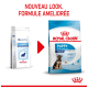 Deux sacs de nourriture pour chiens : à gauche "Royal Canin Pediatric Junior" pour grands chiens, à droite "Royal Canin Puppy Maxi" pour chiots, avec une bannière de nouveau look.
