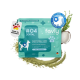 Eine Dose Haustier-Zahnpulver mit der Aufschrift "04 DENTAL PULVER", mit Petersilie, Silica, Chlorella, einem Apfelschnitz und frischer Petersilie.