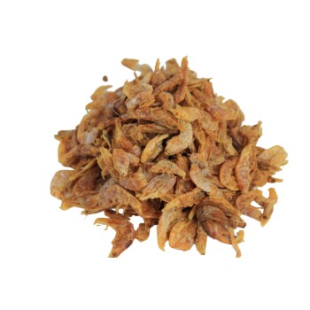 Ein Haufen getrockneter Garnelen, der ihre orange-braune Farbe und knusprige Textur zeigt, ideal für Haustierleckereien.